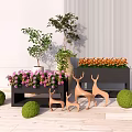 Elegant Flower Planters With Purple Orange Flowers Deer Figurines Green Spherical Plants White Wall