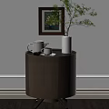 Round Wooden Bedside Table with White Teapot Cup Plant Vase and Wall Framed Flower Painting