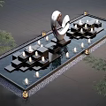 Modern Water Fountain with Silver Sculpture Stepped Platforms Illuminated Lights and Green Plants