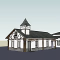 European Style Commercial Complex With Tower Pitched Roof And Stone Walls