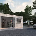 Modern Container Building With Glass Windows Wooden Tables And Outdoor Café Setting Surrounded By Trees