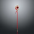 Shiny Golden Weapon with Red Long Handle and Ornate Circular Decorative Head