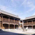 Ancient Chinese Architecture with Traditional Curved Roof Wooden Gate Stone Lions and Ornamental Details