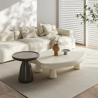 White Unique Shape Coffee Table With Black Small Round Side Table And Beige Sofa Pillows 3d model