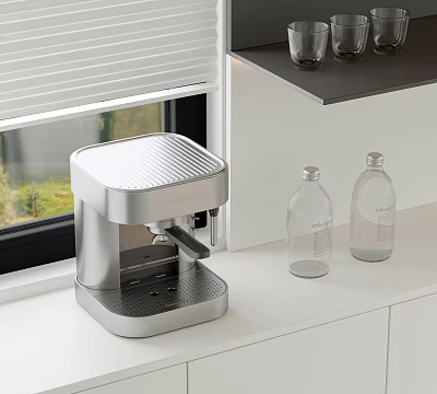 Sleek Silver Coffee Machine As Kitchen Appliance On White Countertop With Transparent Bottles 3d model