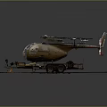 Military Helicopter Model Mounted On Trailer On Sand Ground With Equipment