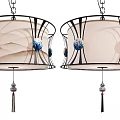 Elegant Chandelier Design With Black Metal Frame Beige Fabric Shade Blue Accent Balls Tassel Pendant