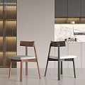 Modern Black Dining Chairs With White Cushions In Kitchen Dining Area