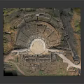 Ancient Amphitheater Ruins With Circular Stone Seats And Historical Archaeological Terrain