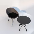 Modern Woven Outdoor Chair with Black Metal Frame and Matching Table