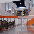 Modern Internet Cafe Reception Area With Sleek Flooring Bright Lighting And Snack Shelves