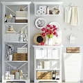 White Bathroom Cabinet With Decorative Mirror Red Flowers Towels And Storage Baskets