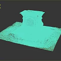 Decorative Stone Pedestal With Moss Covered Top And Carved Details On Green Grass