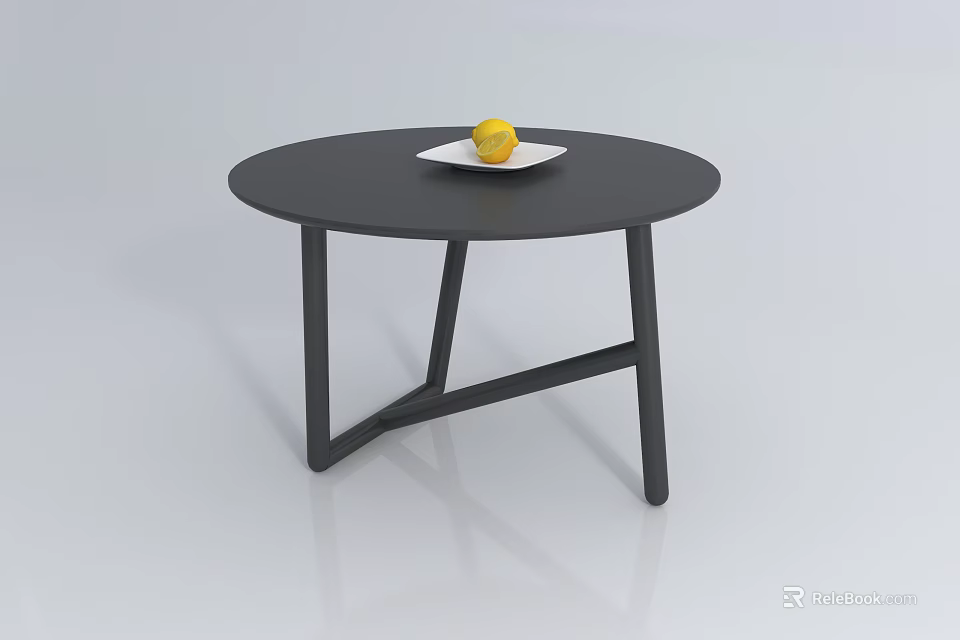 Round Black Coffee Table Featuring White Plate With Yellow Lemon On Top 3d model