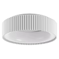 Modern White Flush Mount Ceiling Light with Circular Striped Design and Soft Glow