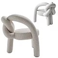 Modern Minimalist Accent Chair With Curved Knot Design And Light Beige Upholstered Fabric