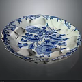 Blue and White Porcelain Plate with Intricate Floral Patterns and Elegant Rim Design