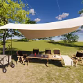 Garden Landscape With Outdoor Canopy Tables Chairs Trees And Green Grass