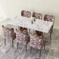Dining Table And Chairs Set With Marble Tabletop Patterned Upholstered Chairs Vase And Plant Decoration