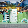 Green Music Themed Installation With Piano Keyboard Microphone Notes And Balloons In Mall Atrium