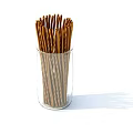 Crispy Twisted Breadsticks in Clear Glass Cup for Snacking