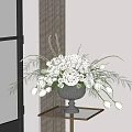Elegant Silver Vase With White Roses Tulips Hydrangeas And Green Foliage On Glass Table