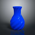 Blue Carved Vase Sculpture With Twisted Texture And Shiny Surface On Dark Background