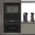 Modern Kitchen Interior With Built in Oven And Coffee Machines On Countertop