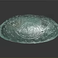 Green Oval Architectural Decorative Element With Intricate Carvings And Glossy Surface