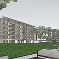 Modern Multi Story Apartment Building With Green Lawn Trees And Outdoor Lounge Chairs