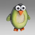 Adorable Avocado Penguin Figurine Featuring Green Body Black Head White Eyes And Orange Feet
