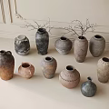 Handmade Ceramic Vessels in Assorted Sizes and Shapes with Rustic Textures and Decorative Branches 3d model