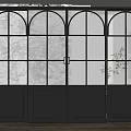 Modern Black Framed Sliding Doors With Arched Tops And Textured Glass Panels