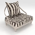 Modern Lounge Chair With Black And White Striped Pattern Light Colored Legs And Geometric Cushion