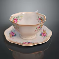 Vintage Porcelain Teacup And Saucer With Floral Pattern And Gold Trim