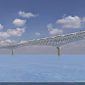 Modern Bridge With High Speed Train Crossing Over Blue Water and Sky