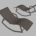 Two Modern Outdoor Lounge Chairs With Metal Frame And Woven Design
