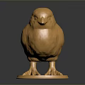 Golden Baby Chick Sculpture With Metallic Sheen On Circular Base Dark Background