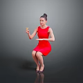 Elegant Woman Sitting Holding Yellow Cup In Red Dress Against Dark Background