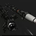 Camouflage Military Missiles With White Warhead Red Tip And Engine Section Displayed On Gray Background