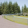Scenic Park Landscape With Large Sculpture Green Lawns Purple Flower Beds Visitors And Coniferous Forest