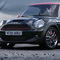 Green MINI Cooper Car with Red Roof Driving on Rural Countryside Road 3d model