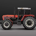 Sturdy Red Agricultural Tractor With Large Wheels And Enclosed Cab