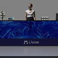 Modern Blue Reception Desk With Liemu Logo And Receptionist At Work