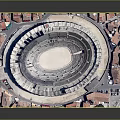 Historic Circular Roman Architecture with Arched Facades and Red Tiled Roofs Surrounded by Traditional Buildings