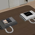 Gray And White Telephones With Display Screens And Curly Cords On Wooden Table