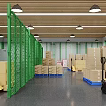 Industrial Warehouse Interior with Green Metal Fences Stacked Cartons and Forklifts