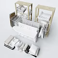 Laundry Essentials Display With Drying Rack Folded Towels And Hanging Clothes