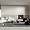 Modern Living Room Interior With White Curved Sofa Pillows Fireplace And Round Coffee Table
