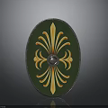Oval Decorative Shield With Green Background Yellow Floral Pattern And Metal Center Ornament